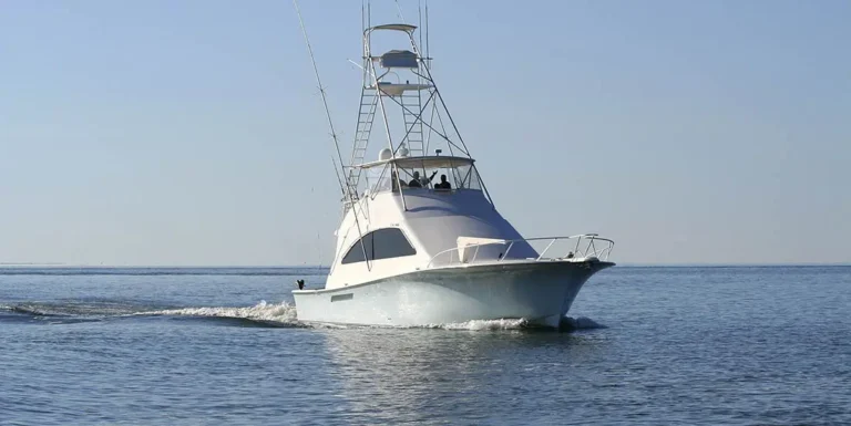 Sportfishing charter boat cruising in calm South Florida ocean waters